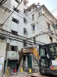 五年100臺，“五里模式”跑出加梯加速度
